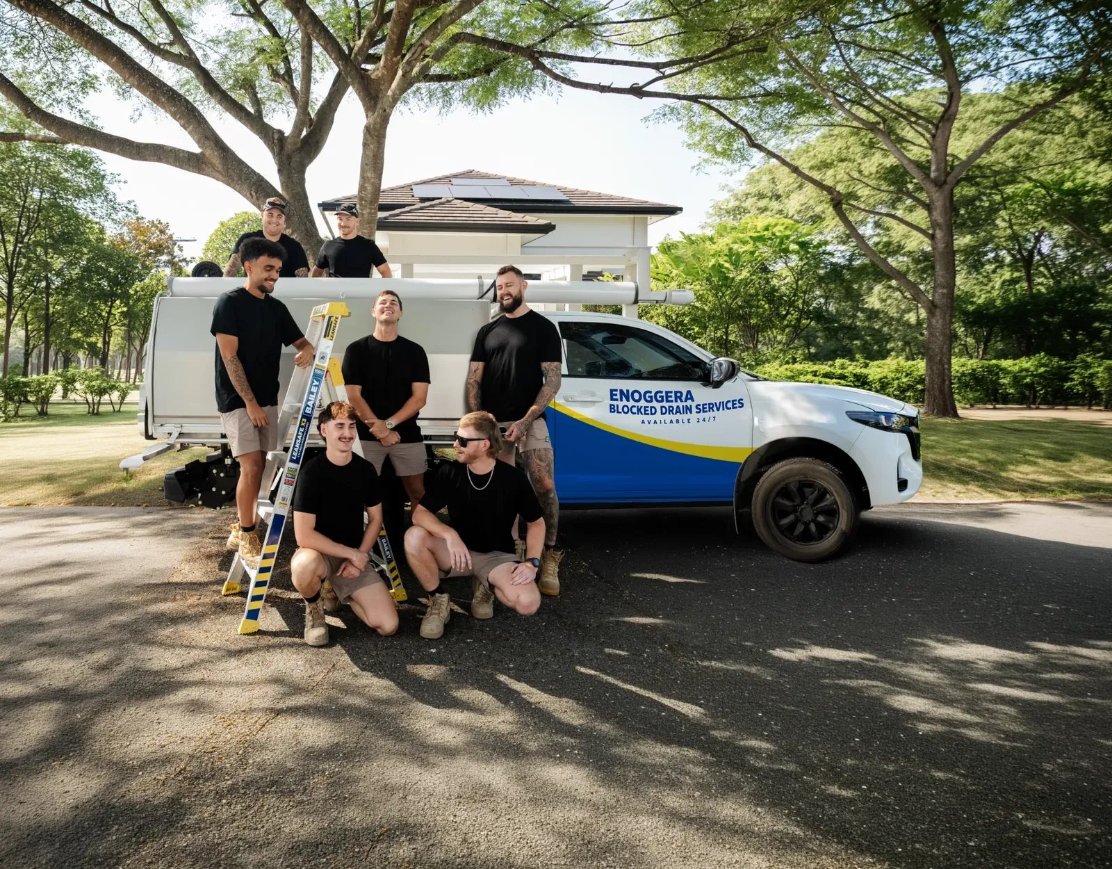 Enoggera Blocked Drain Services team and ute